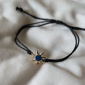 Gold Sun Charm Bracelet with Black Cord